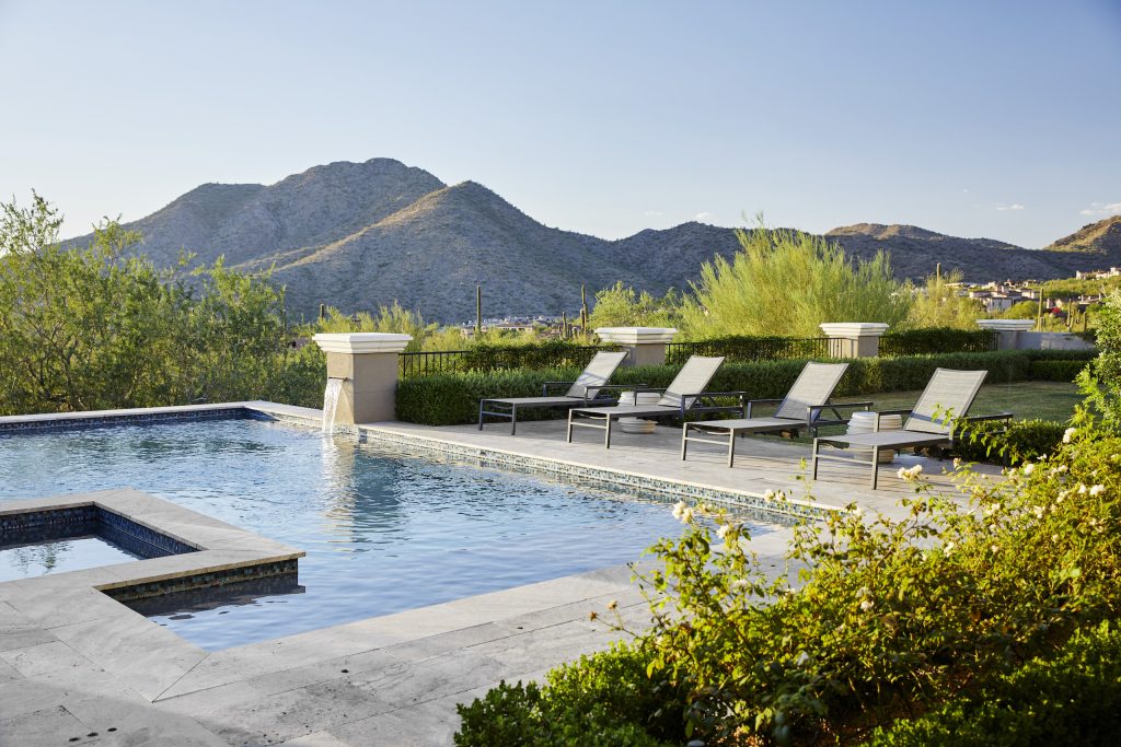 Pool terrace at Modern Mediterranean with mountain views