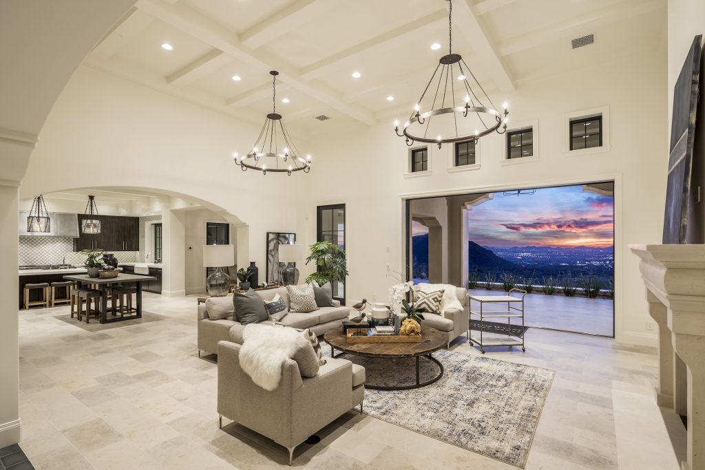 Great room opening to a sunset terrace at Andalusian Modern by Calvis Wyant