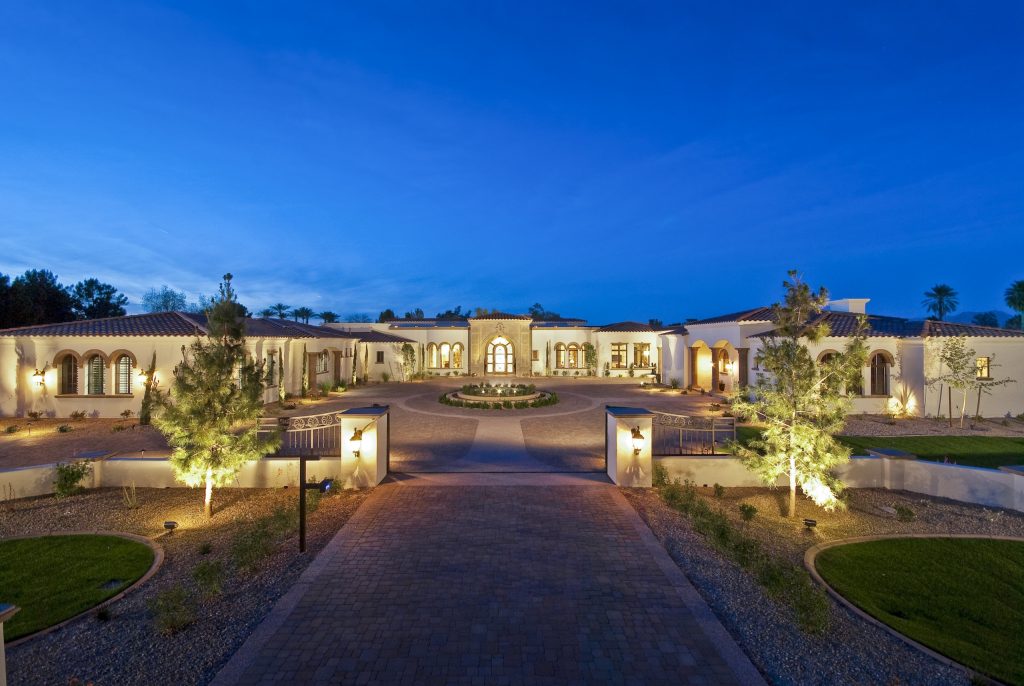 Illuminated front elevation and motor court at Mockingbird Estate